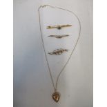 A group of 9ct gold Victorian and Edwardian brooches, and a pendant, the heart-shaped pendant set