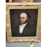 A 19th century portrait of a gentleman, oil on canvas, set in an ornate gilt wood frame A/F 60cm x