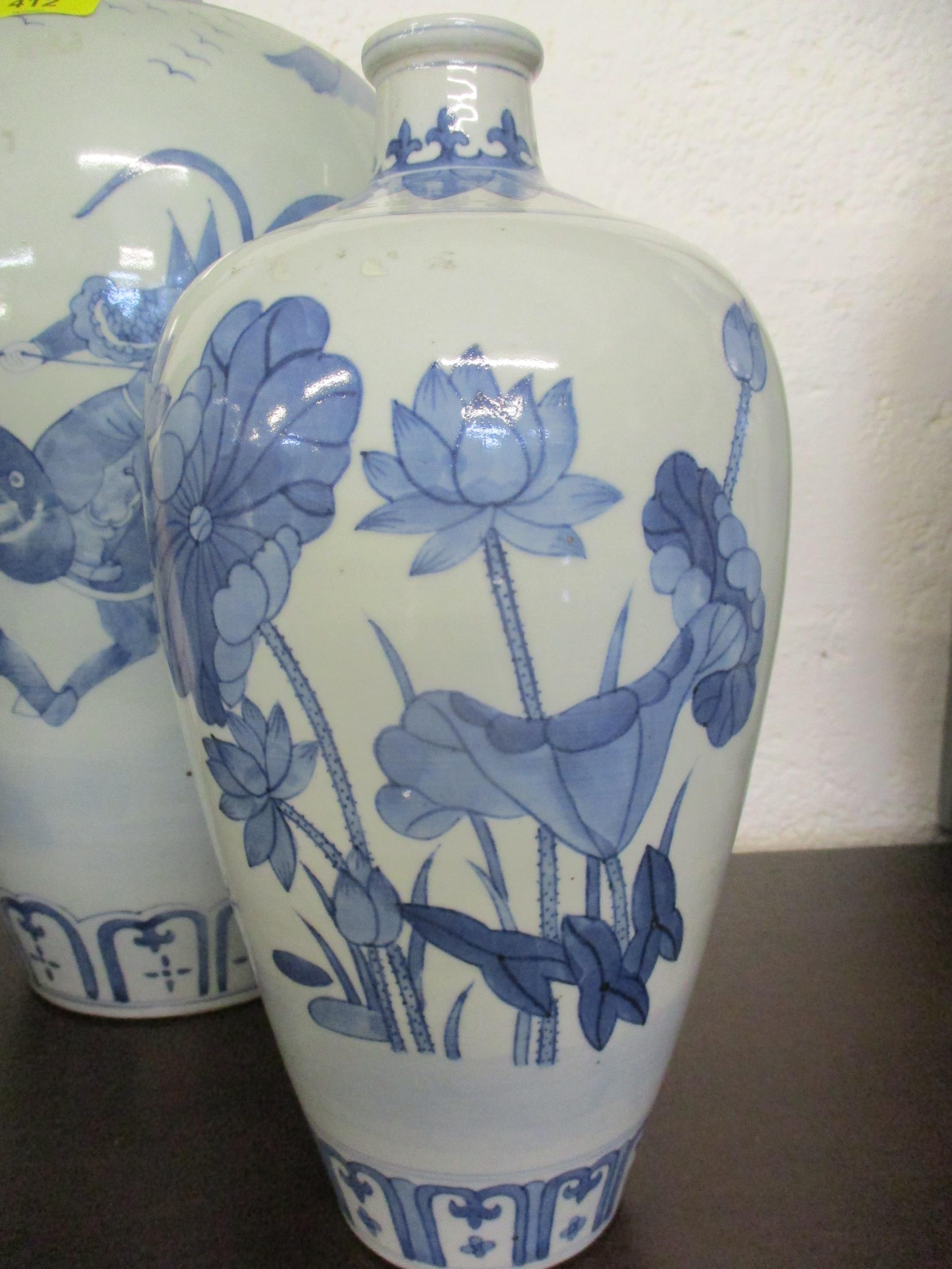 A group of three 20th century Chinese blue and white vases in varying sizes and colours, the tallest - Image 3 of 9