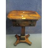 A Regency rosewood work table with a hinged top and over a drawer and square tapered column on