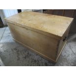 A Victorian pine chest with a hinged lid and twin carrying handles, 65.5h x 129cm w