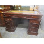 A Victorian mahogany twin pedestal desk having a leather topped scriber and nine inset drawers 75.
