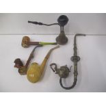 Mixed pipes to include an Indian white metal pipe and others