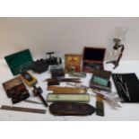 Vintage collectables to include fishing equipment, compass sets, wooden rulers, coffee maker,