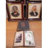 A Victorian leather bound family photograph album with various portrait photographs, a Victorian