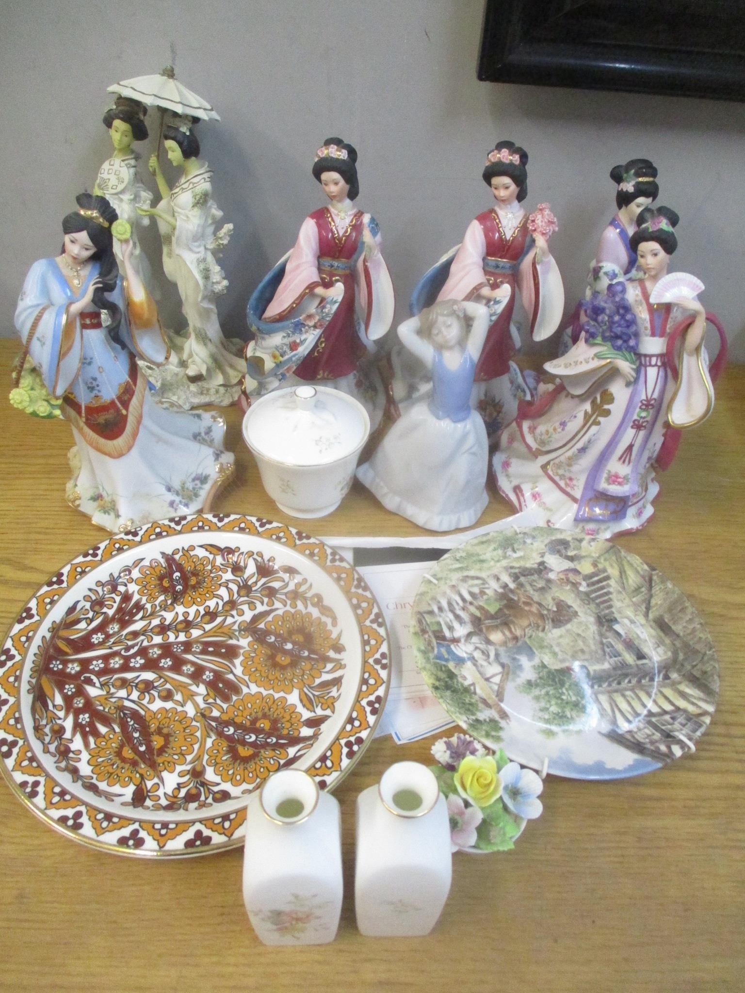 Collectables to include Danbury Mint figures, a Nadal figure, Royal Doulton Mystic Dawn vases and