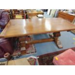 A 20th century oak refectory dining table, 75 h x 183 w x 91cm d