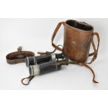 A pair of WWI era Bush Prisma-Binocle 'Terlux' style long range binoculars an tan leather case by