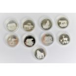 Thirty years of WWF - a collection of nine silver proof tokens produced by Pobjoy Mint in 1986 to