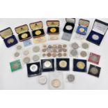 A group of commemorative boxed coins to include the sterling silver Princess Elizabeth and Prince