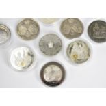 A collection of silver proof and commemorative coins to include four 'Golden Wedding' collection
