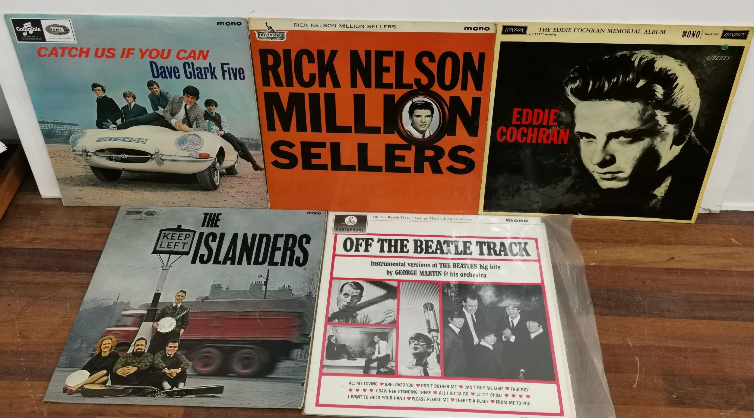 Five 1960's vinyl records to include Eddie Cochran, Off the Beatle Track, The Islanders, Rick Nelson