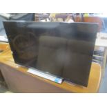 A Toshiba television, 32 inch