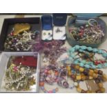 A mixed lot of costume jewellery to include beaded necklaces, bracelets, rings and other items