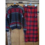 A vintage Norwegian woollen knitted jumper in navy having a red reindeer frieze, 40/42" chest x27"