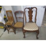 Three chairs to include an Arts & Crafts child's correction chair, a walnut framed dining chair