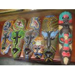 Six African tribal carved, painted masks