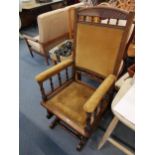 A Victorian rocking chair with galleried sides and cane seat, Location CF