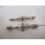 A 9ct gold stick brooch set with amethyst and pearls with a metal pin, 2.4g and a Victorian 15ct