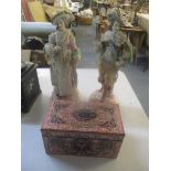 A pair of German 19th century figures together with a decorative inlaid tea caddy