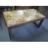 A vintage tile topped coffee table 40cm h x 85cm w