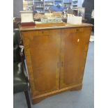 A reproduction yew two door cabinet, Location Back Row