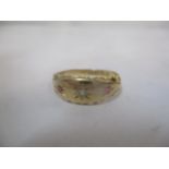 An 18ct gold ring set with a diamond and rubies, 2.55g