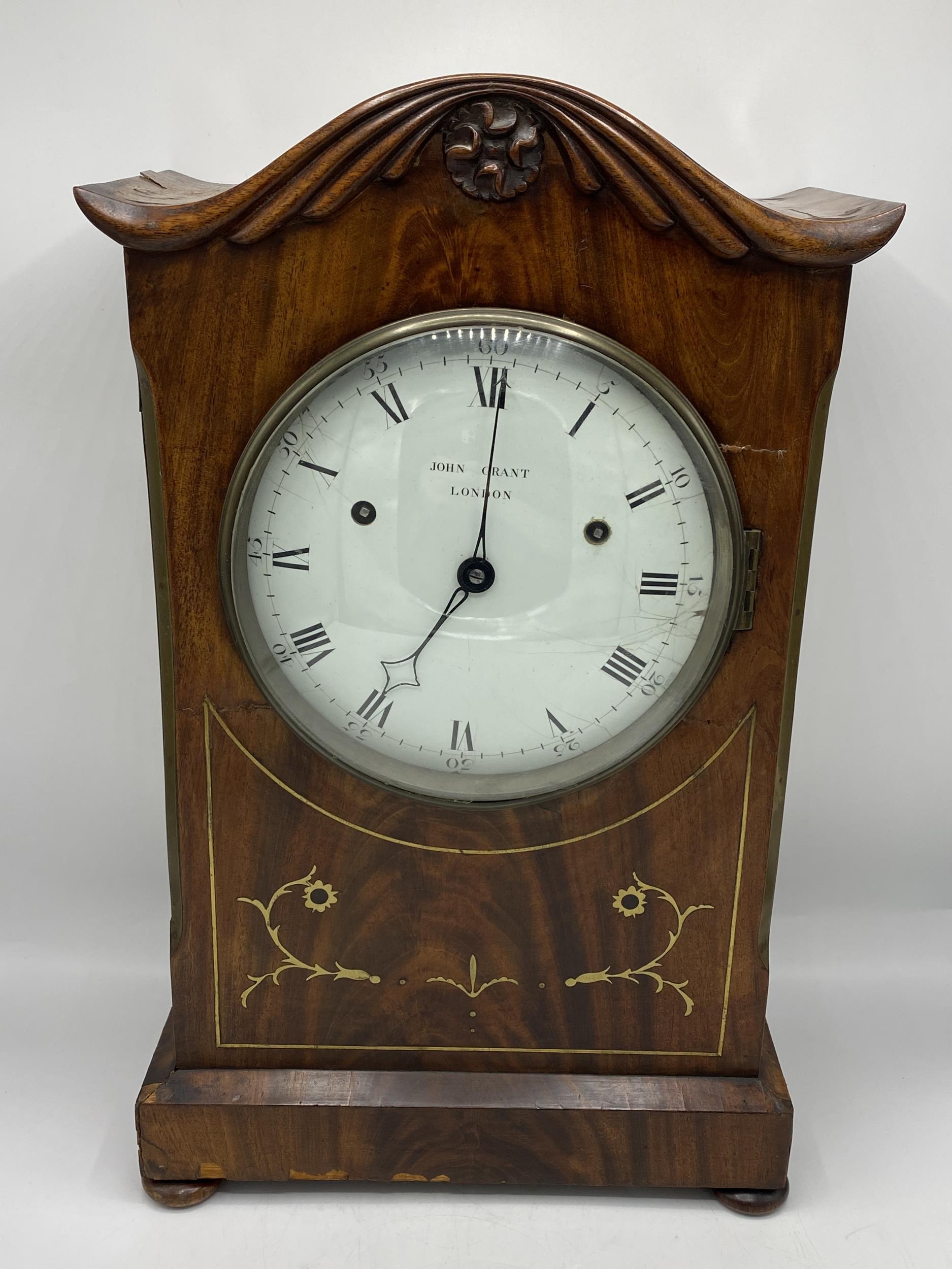 An interesting Regency mahogany bracket clock, the white 8 inch enamel dial signed 'John Grant