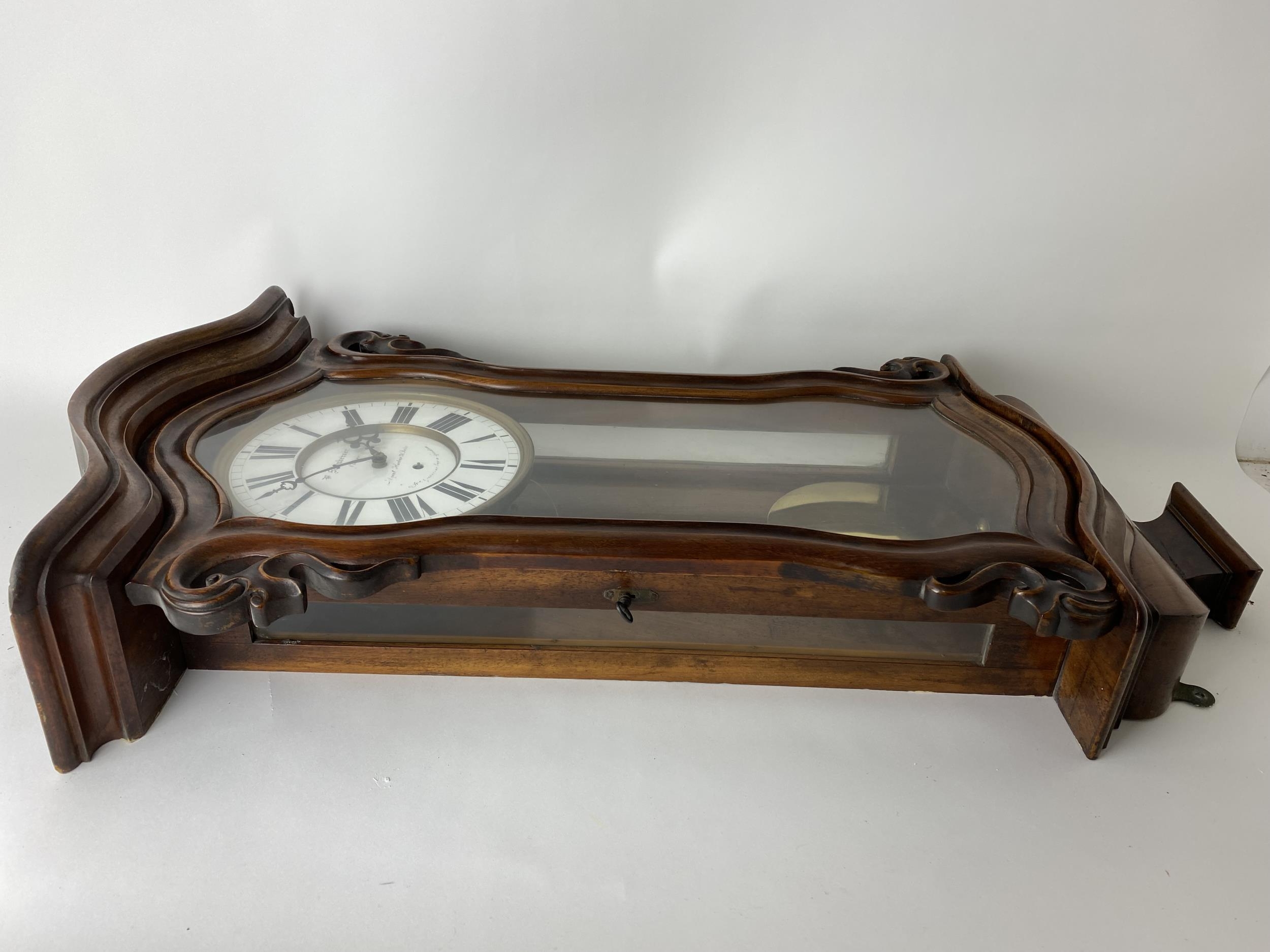 A late 19th century walnut 8 day Vienna regulator wall clock, the circular dial having black Roman - Image 6 of 8