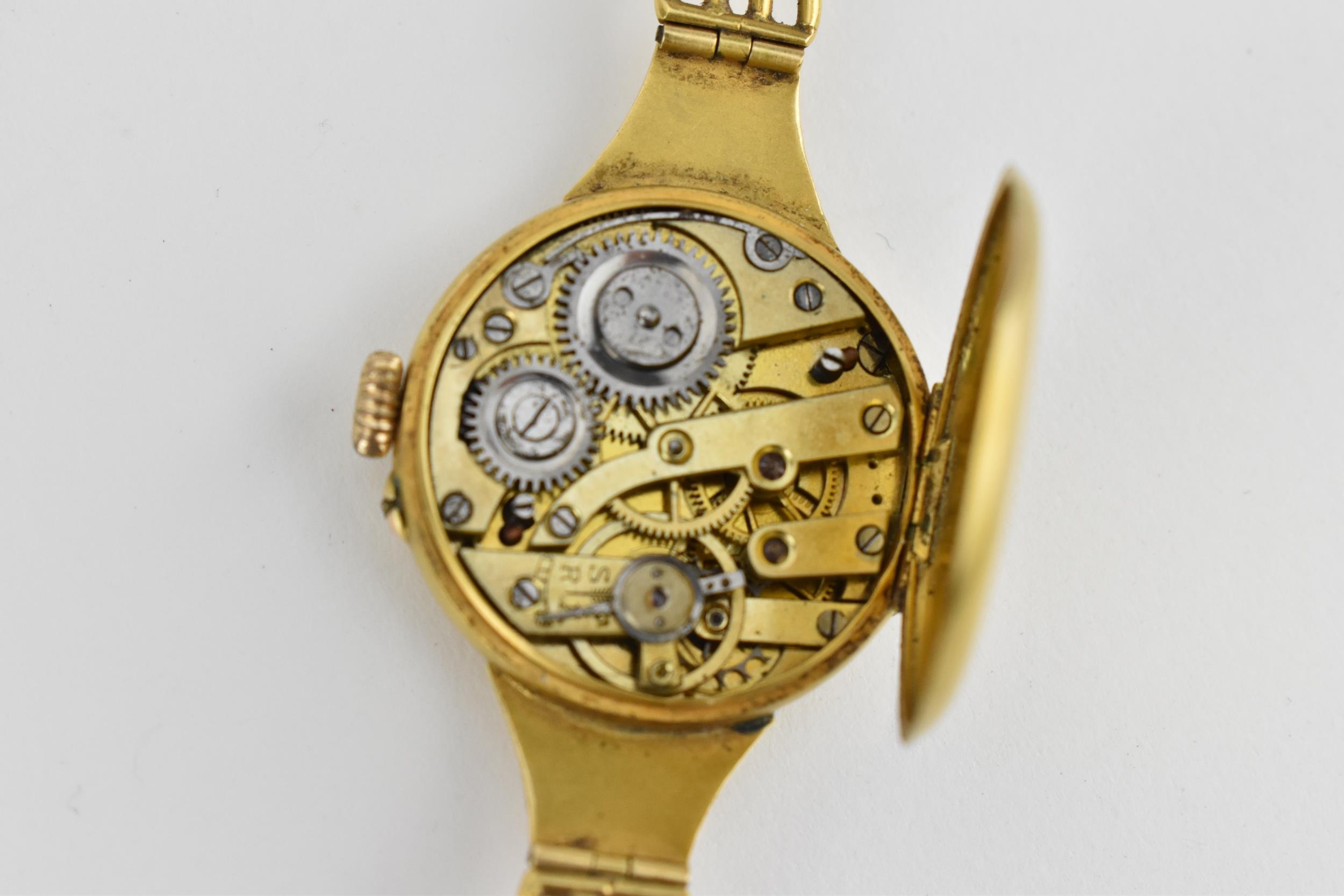 A Swiss early 20th century ladies 18ct gold cylinder wristwatch. The dial signed T.R.F with - Image 4 of 6