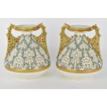 A pair of late 19th century Grainger and Co Worcester porcelain reticulated vases, after a design by