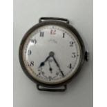 An early 20th century Zenith silver cased wristwatch, the white enamel dial having Arabic