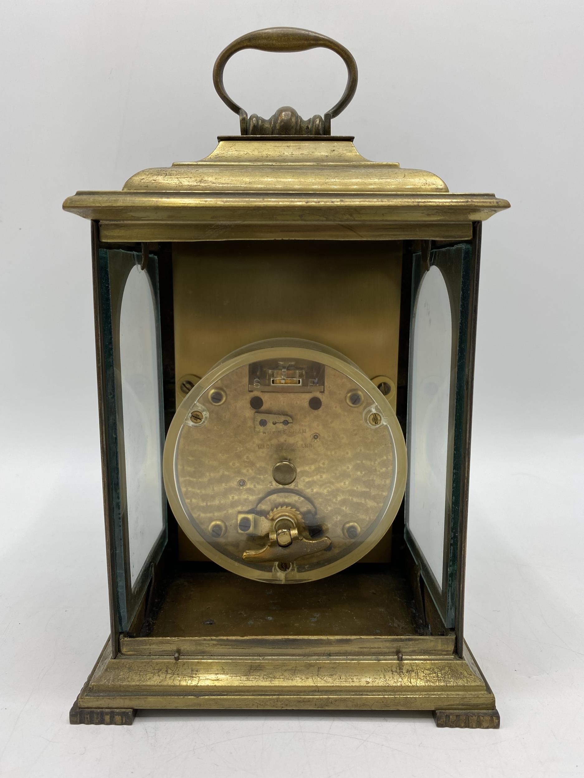 A late 19th century brass cased mantle clock having a silvered dial with Roman numerals with pierced - Image 3 of 4