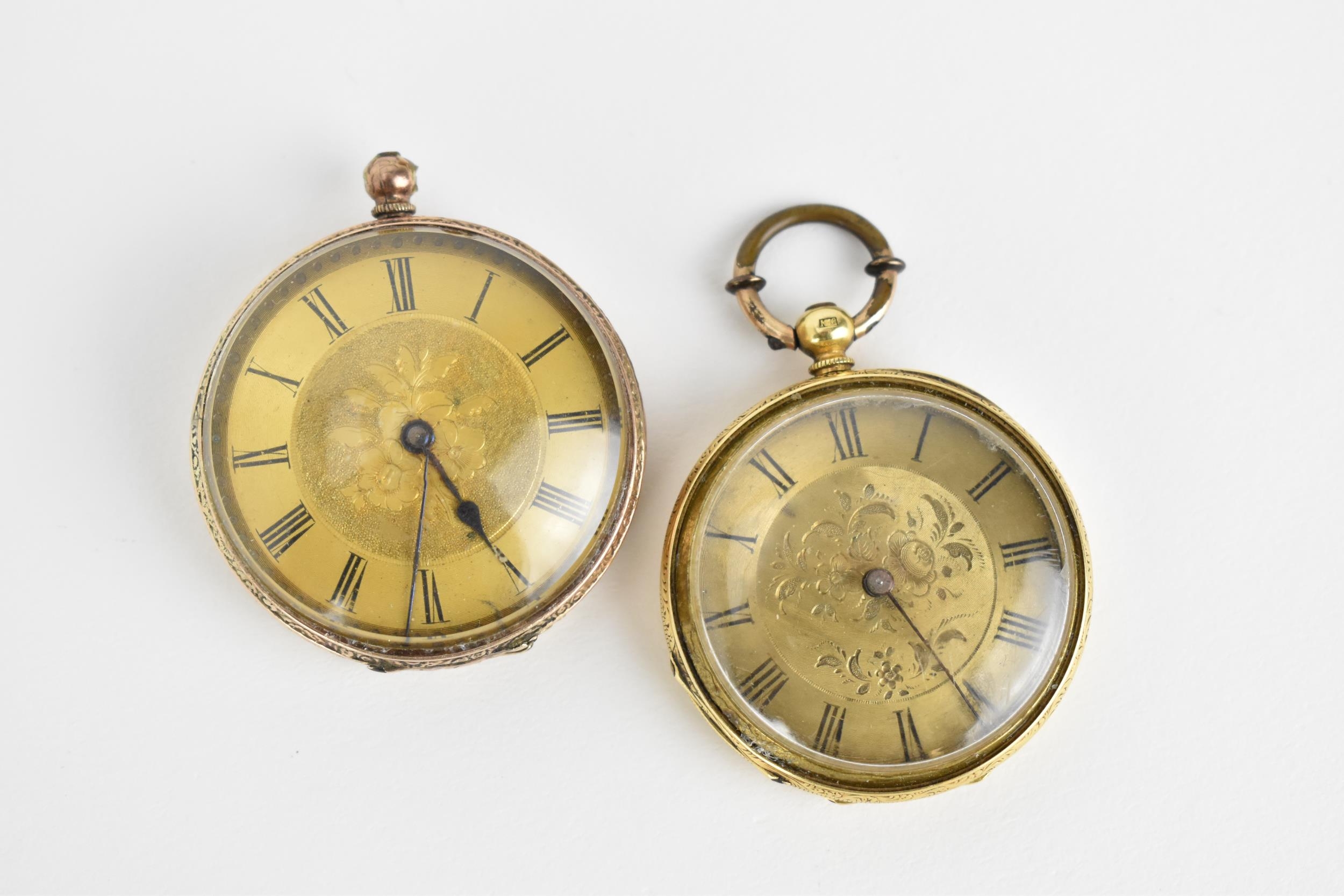 A pair of late 19th/early 20th century key-wound open faced pocket watch to include an engine turned