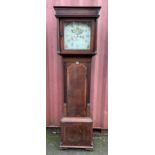 A George III oak longcase clock, the dial having painted floral decoration, moon phase dial above