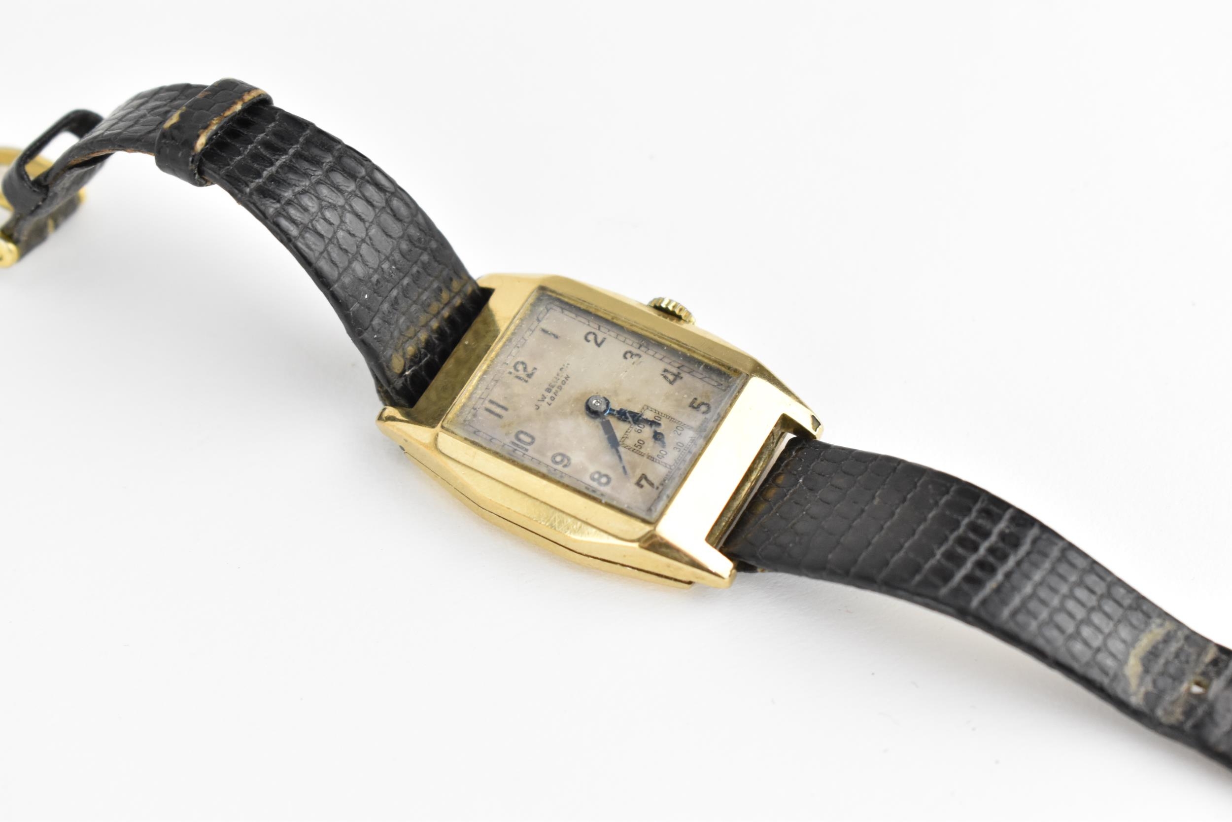 An early 20th century J.W Benson, London 9ct gold cased wristwatch with rectangular dial having