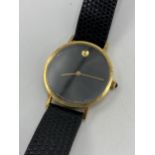 A Movado Zenith 18ct gold gents manual wind wristwatch, the black museum dial with gilt twelve o'