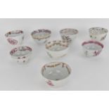 Eight 18th and 19th century English tea bowls, each decorated in polychrome enamels with flowers and