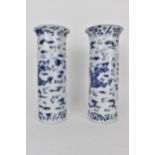 A pair of late 19th century Chinese blue and white porcelain vases of cylindrical form decorated