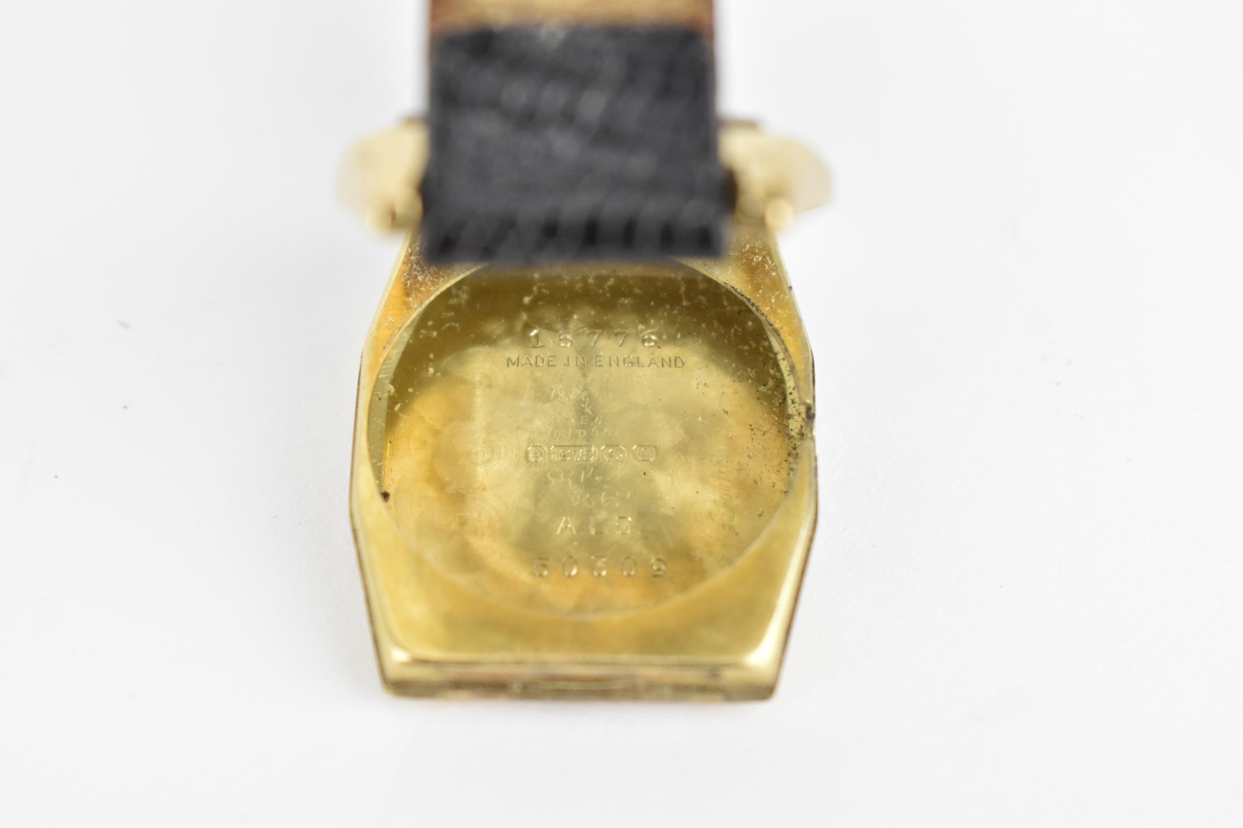 An early 20th century J.W Benson, London 9ct gold cased wristwatch with rectangular dial having - Image 5 of 6