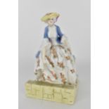 A Royal Worcester porcelain figure of Lady Bountiful, No 3097 modelled by G.M Parnell, 18cm high