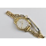 A 1965 Omega ladies gold plated wristwatch having a silvered dial with Arabic numerals, 17 jewels
