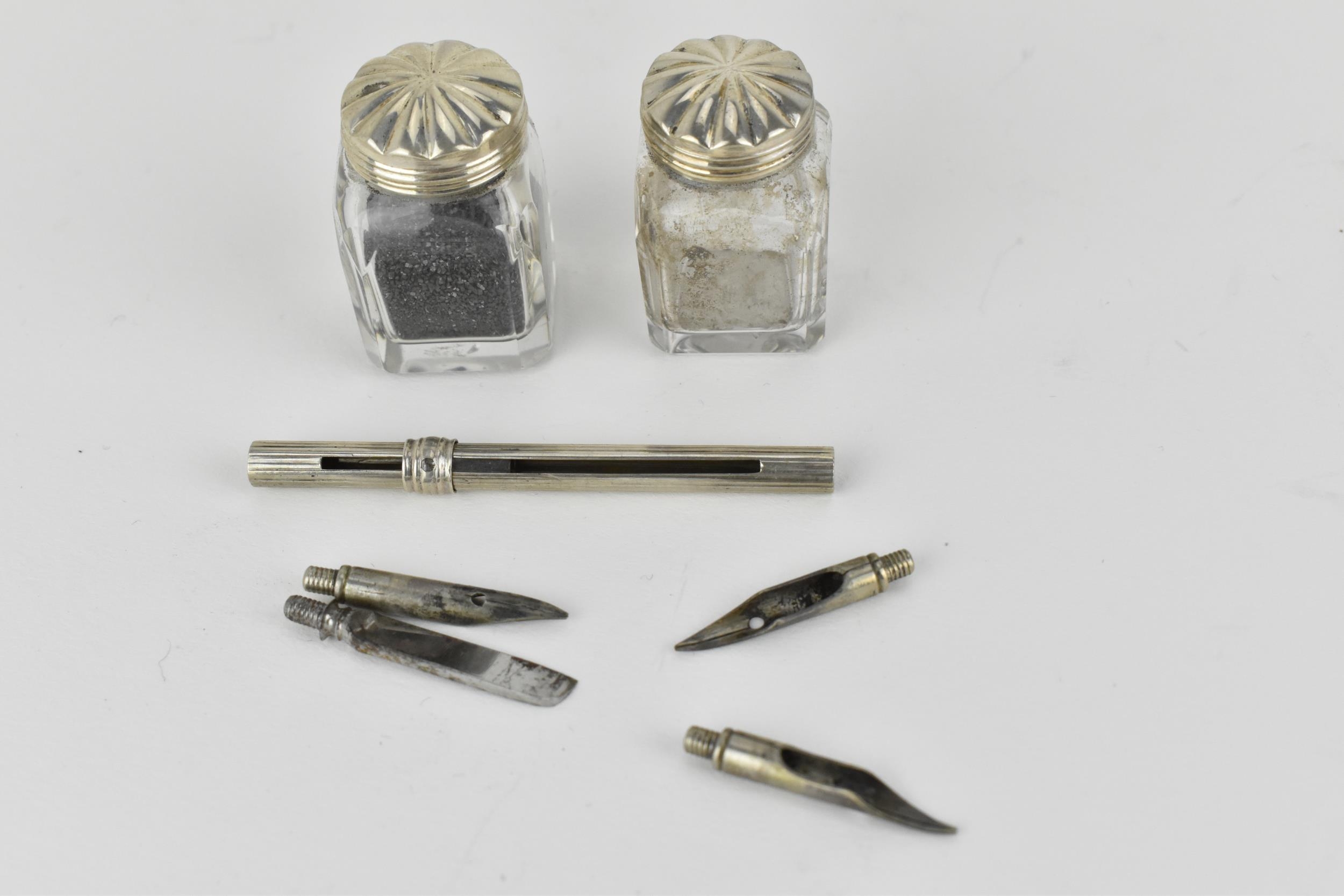 A 19th century tortoise shell cased travellers pen set, the arched topped box enclosing two - Image 8 of 11