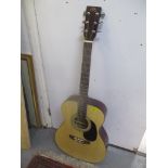 An SX guitar acoustic, serial o 8801916, model OM160/NA Location: