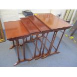 A nest of four mahogany graduated tables on turned legs, largest 59cm h x 53cm w Location: