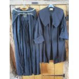 A vintage Harrods black ladies coat having three quarter sleeves with deep fold-over cuffs and a