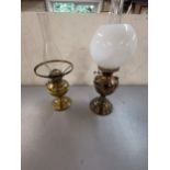 Two brass oil lamps Location: A2