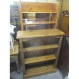 Three modern pine bookcases to include a three tier bookcase on a plinth base, 117cm x 92cm,