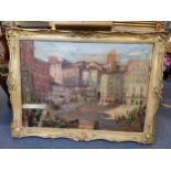 An early 20th century oil on canvas, Continental street scene, unsigned, set in ornate gilt wood