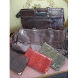 A Tuni leather weekend bag, together with three snakeskin clutch bags and a vintage reptile skin